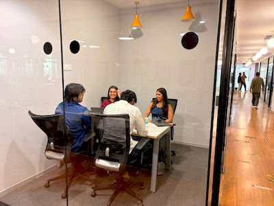 upGrad Ghaziabad office - student and parents with the counselling team after their study abroad session